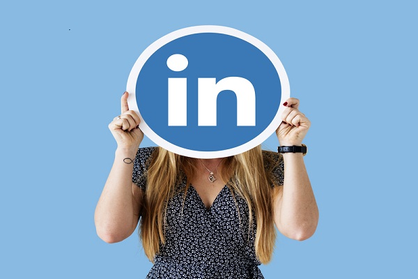 Woman Holding A Social Network Icon
